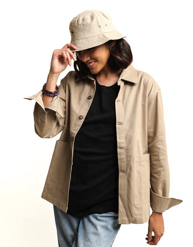 Bob réversible beige Nazca Upcyclé  ultra résistant. Logo brodé à l'avant des deux côté. Made in Perú, pays de production du coton de Pima. Bobs 100% coton,  matières naturelles,  accessoires unisexes, upcyclé 